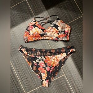 Maaji reversible bikini-floral pattern. Size M/L.